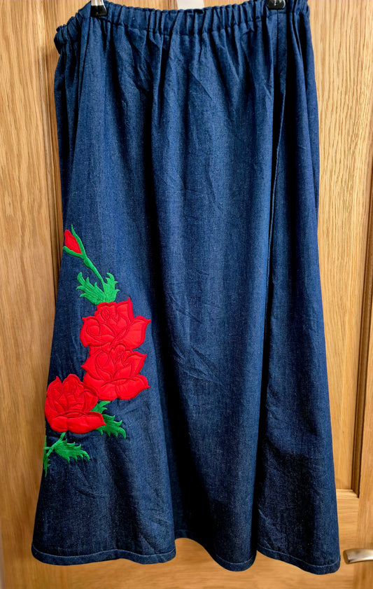 Gorgeous Vintage denim skirt with front rose detail. Size 16/18